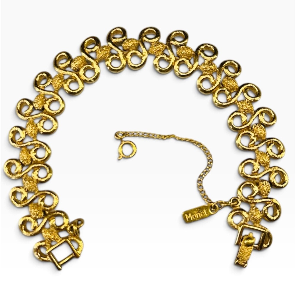 Vintage 1960s Monet Gold Tone Textured Scroll Loop Link Charm Bracelet Signed
